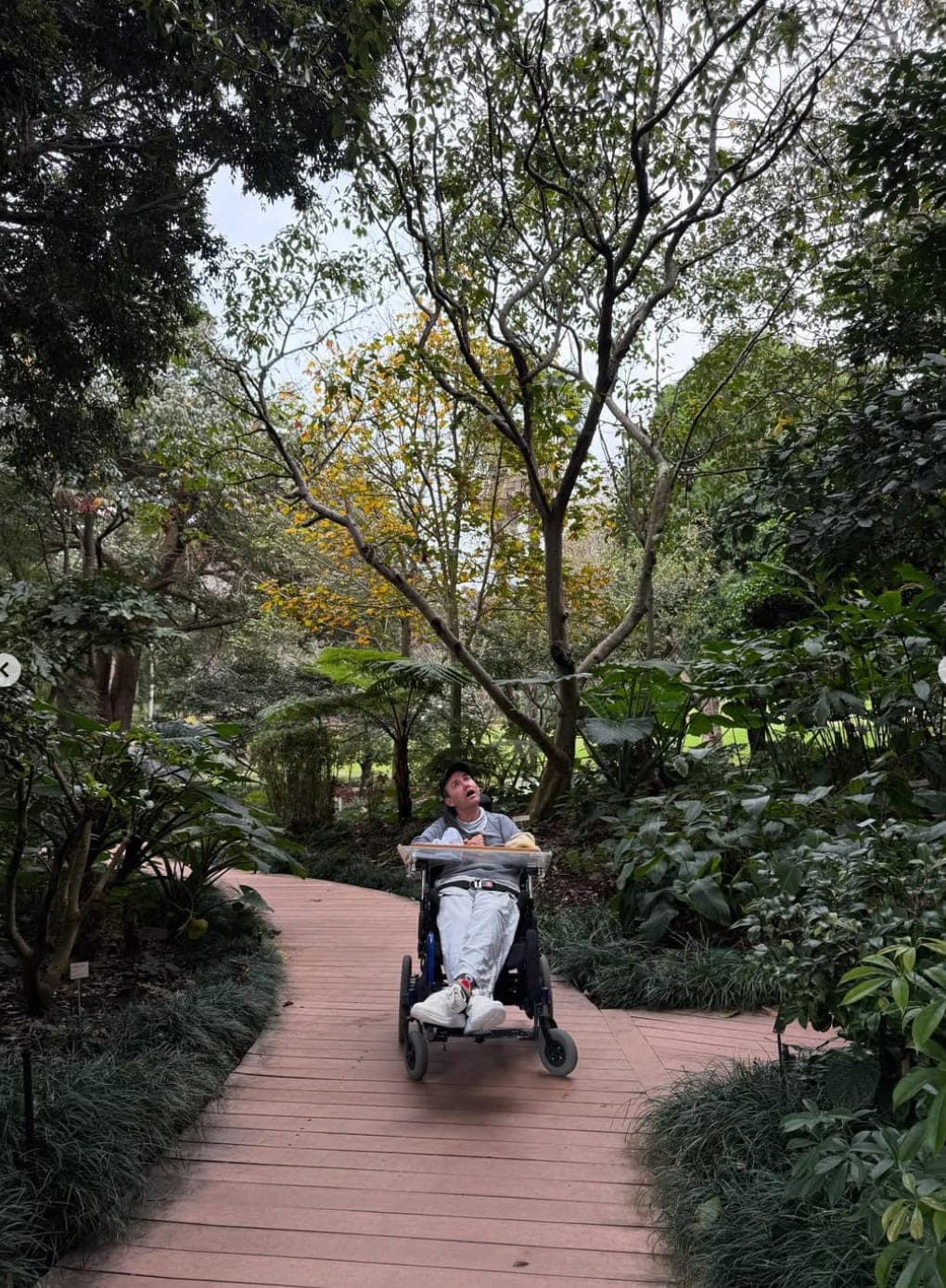 An Abound participant enjoying time outdoors in a garden